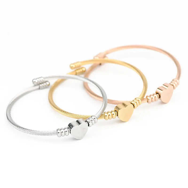 Aurelia™ Gold Heart Seal Bangle - Image 6